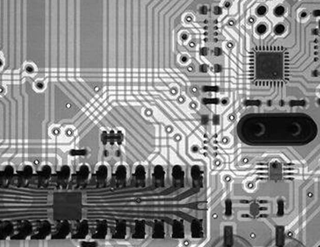 X-ray view revealing voids and plating thickness variations in multilayer PCB vias'