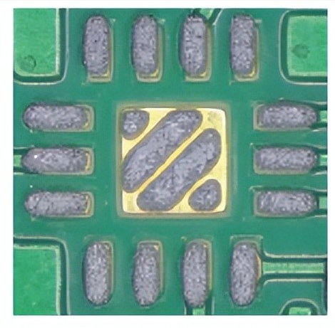 Close-up of solder paste deposits on BGA and QFN pads after stencil printing