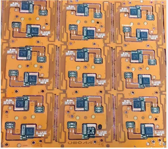 Top-down view of multiple flex PCB designs arranged on a manufacturing panel