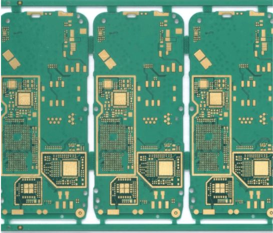 Top view of multiple PCBs arranged in a rectangular panel with spacing and tooling holes